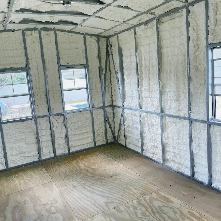 Closed-cell spray foam insulation applied to wall cavities in a residential project in Saratoga Springs